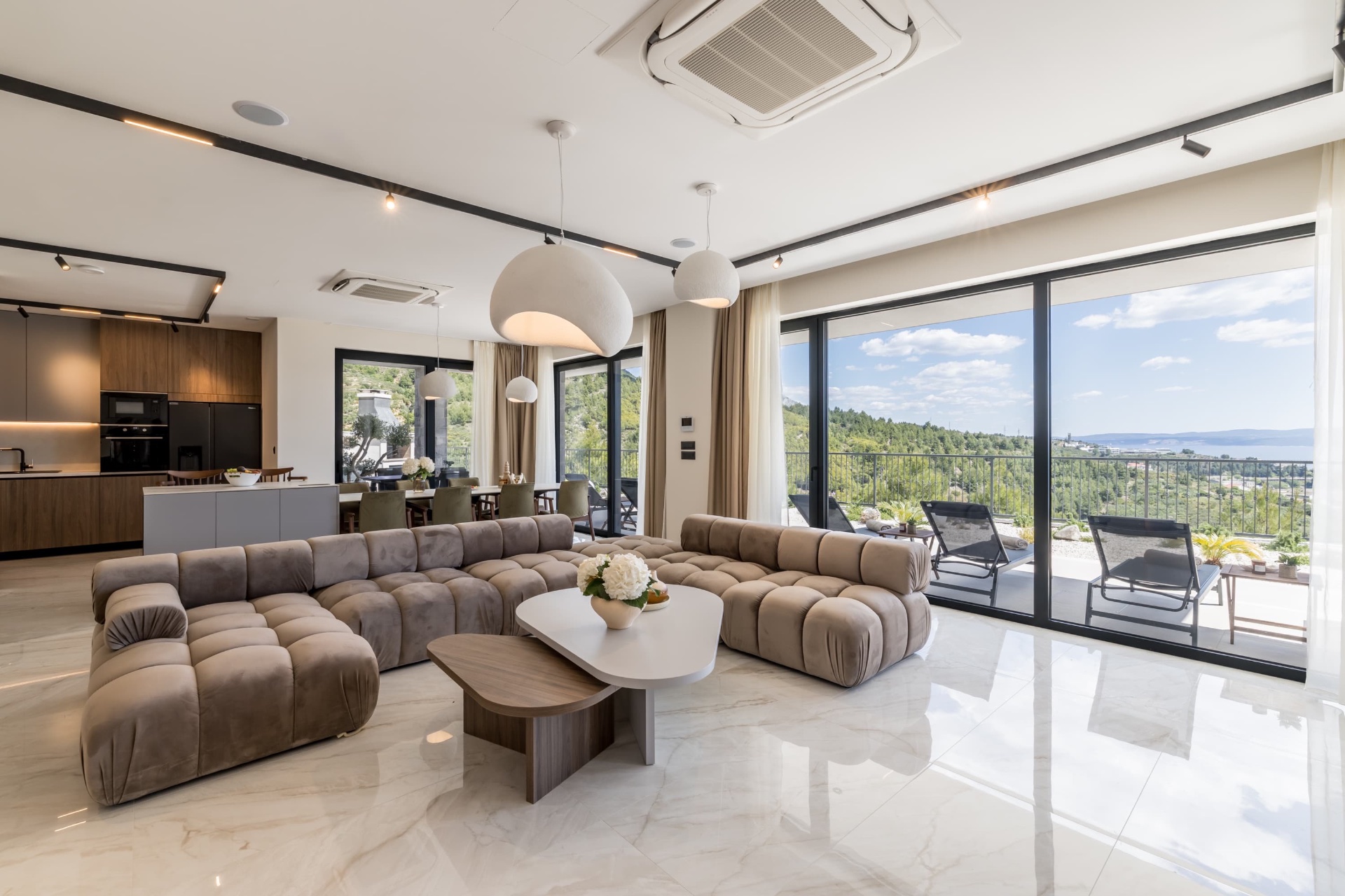 Open-plan living room with panoramic view