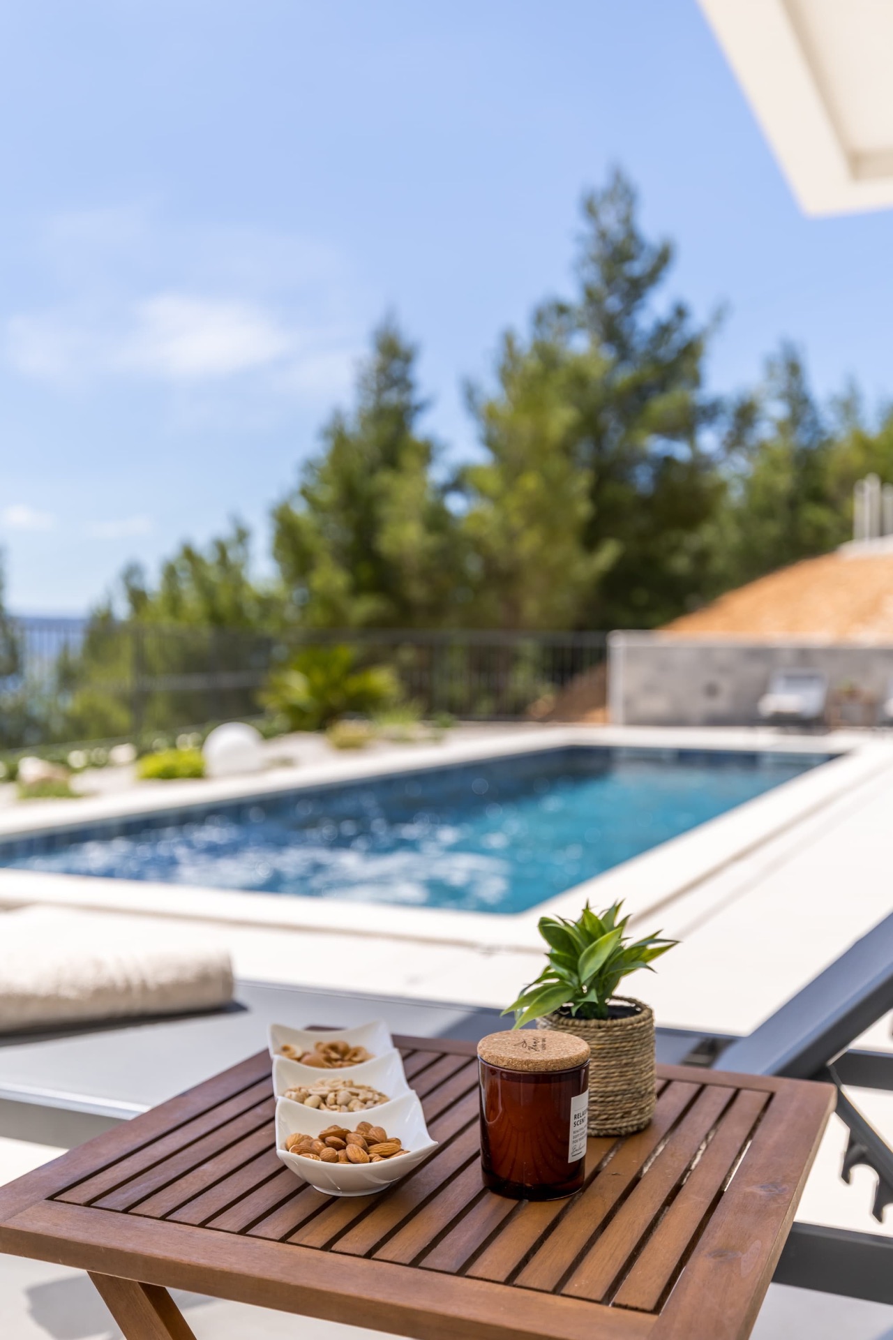Poolside lounger with sea view