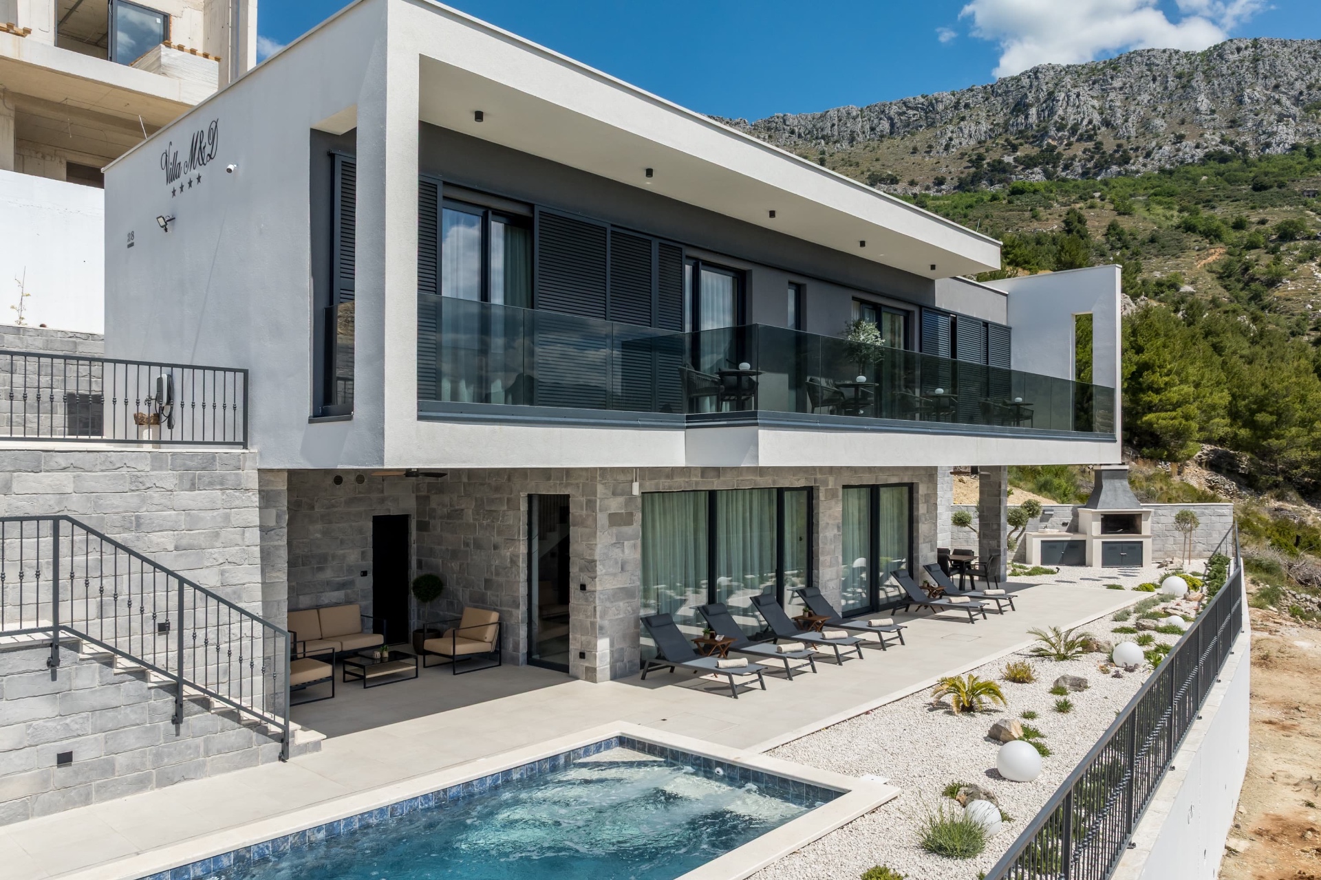 Villa M&D — full exterior with terrace and jacuzzi